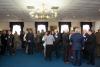 Members of the main line networking as they anticipate inspirational words from 