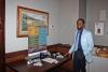 Christian Hicks from event sponsor Penn State Great Valley displays resource table with information for the young professionals 