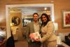 Steven Pompeo from Comcast Spotlight presents  Kaushika Kansara from Dupli Envelope and Graphics with Phillies tickets she won in the business card raffle from Comcast Spotlight