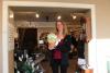 Melanie Bickings from AG Marketing Solutions wins cake pop arrangement ,from Moore's Furniture, in business card raffle